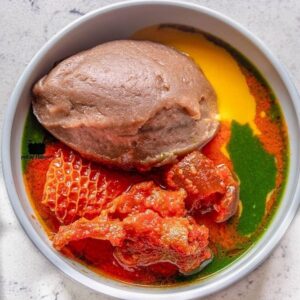 Abula Special: A combination plate featuring Amala, Ewedu soup, and Gbegiri (bean soup). A true Yoruba delicacy.
