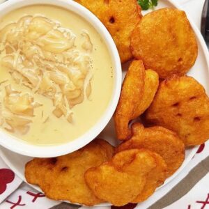 Crispy Akara (bean fritters) served with smooth, warm Pap (Ogi/Akamu).