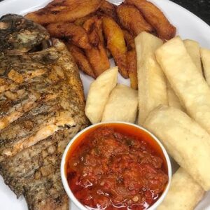 A whole fish, perfectly grilled and served with your choice of sweet Fried Plantain or soft Boiled Yam.