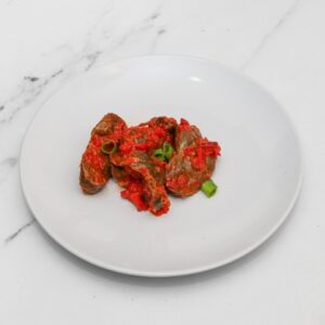 Chunks of premium gizzard, slow-cooked and glazed with our intense peppered sauce.