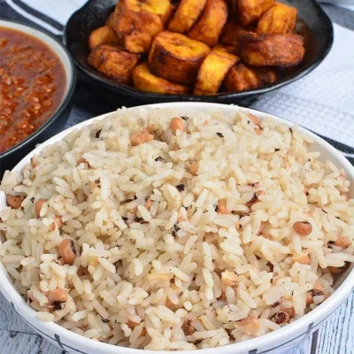 A comforting classic! Rice and Beans served with Plantain and your choice of protein.